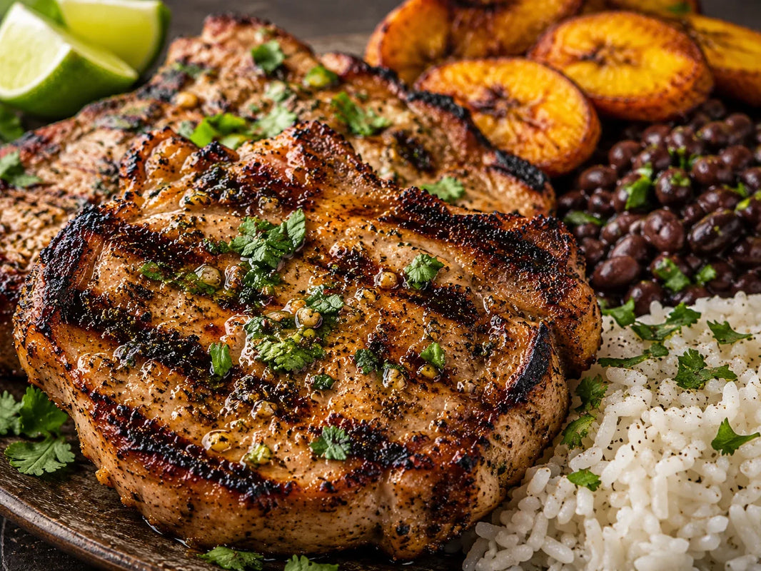 Grilled Berkshire Boston butt steaks with Cuban mojo, rice, black beans, and plantains